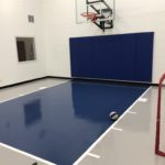 POH32_Plymouth_white knight gray and blue expoxy Twin Cities Spring Parade of Homes indoor basketball court featuring an epoxy floor in gray and dark blue installed by Millz House