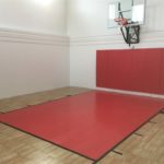 Indoor game court in Annandale with SnapSports Revolution Tuffshield Light Maple with red lane