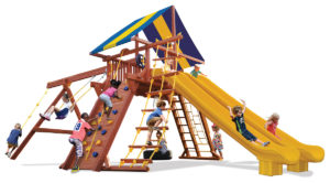Extreme Playcenter swing set features large play deck, climbing wall, ladders, tire swing, belt swings, and two slides
