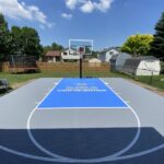 72" Proforce Basketball Hoop
White Game Lines, Custom Logo
SnapSports Duracourt Athletic Tiles in Gray with a Sky Blue Lane
26' × 26' Outdoor Basketball Court